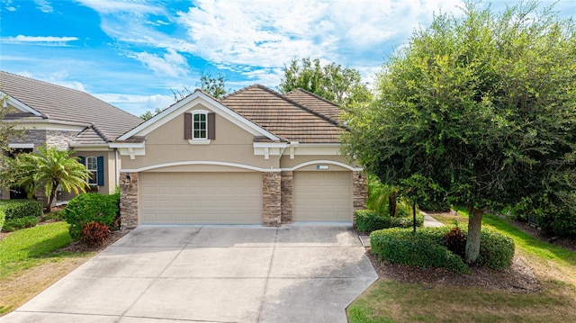 view of front of property with a garage