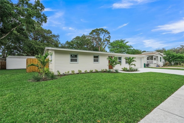 single story home featuring a front lawn