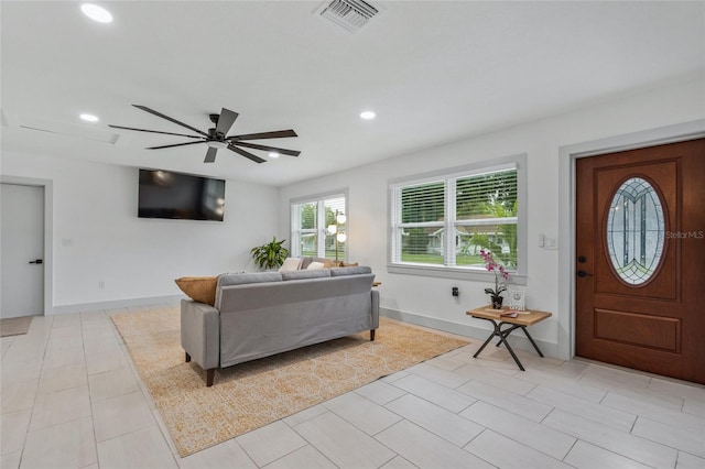 living room with ceiling fan