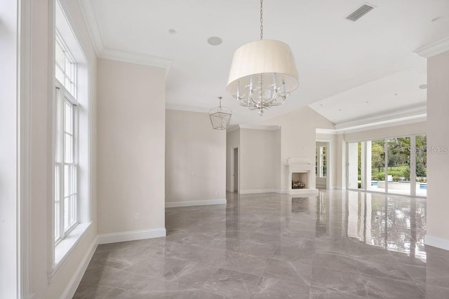 unfurnished living room with a notable chandelier and crown molding