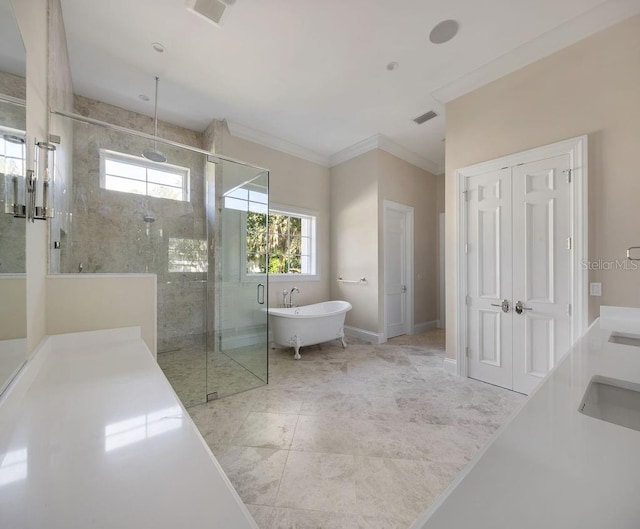 bathroom featuring crown molding, shower with separate bathtub, and vanity