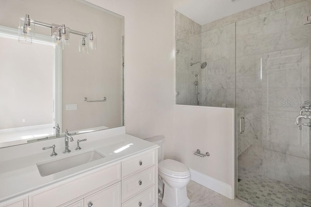 bathroom with walk in shower, vanity, and toilet