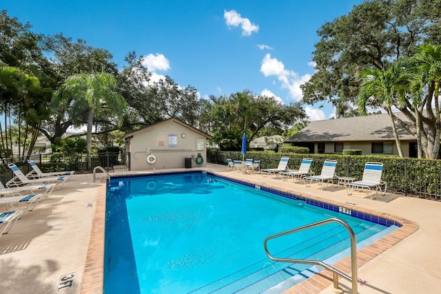 view of swimming pool featuring a patio