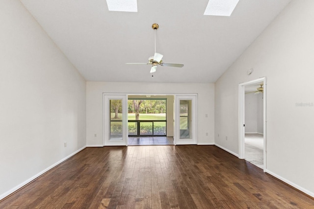 unfurnished living room with a skylight, ceiling fan, dark hardwood / wood-style flooring, and high vaulted ceiling