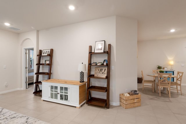 living area with light tile patterned floors