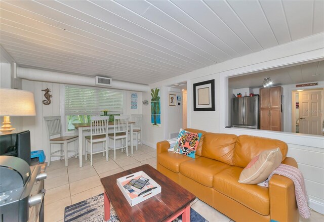 living room featuring light tile patterned floors