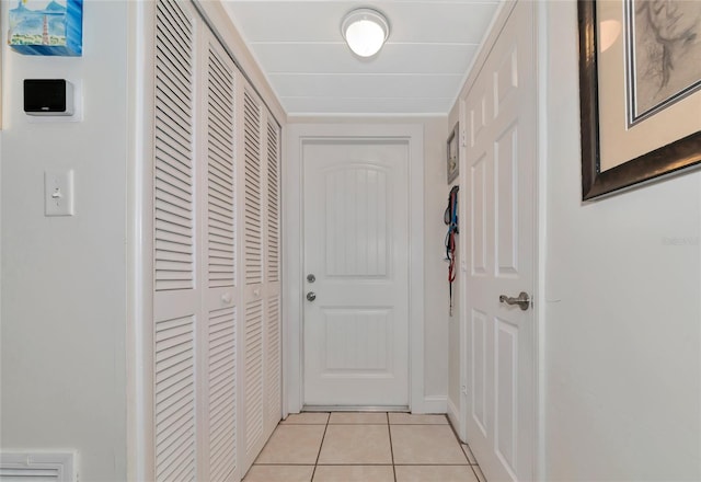 entryway featuring light tile patterned floors