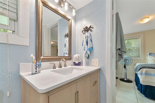 bathroom with vanity and tile patterned floors