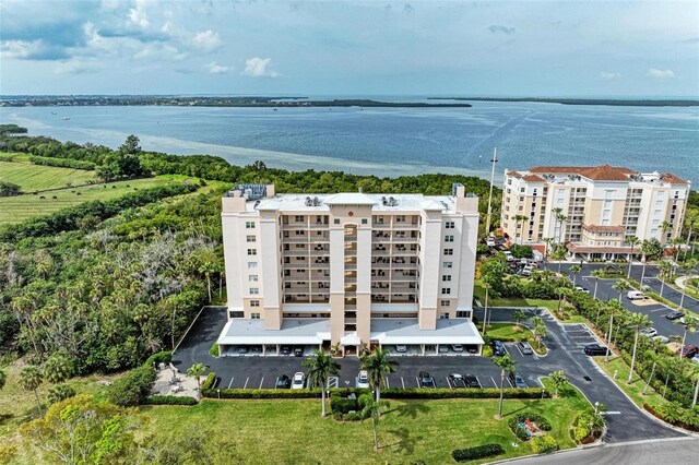 birds eye view of property featuring a water view