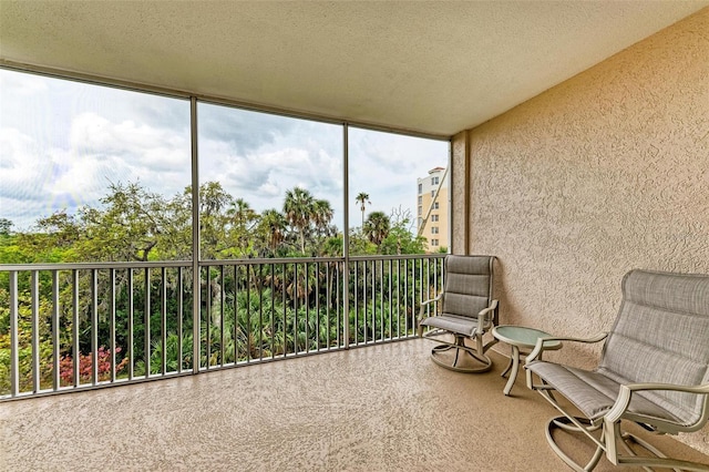 unfurnished sunroom with a wealth of natural light