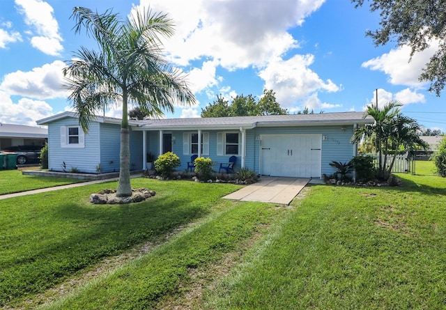 ranch-style home with a front yard and a garage