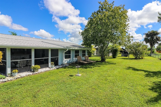 22119 Laramore Ave, Port Charlotte, FL 33952 - view of yard with a sunroom and fence