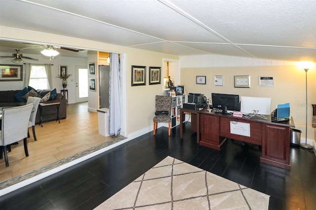 office area featuring a textured ceiling, hardwood / wood-style floors, and ceiling fan