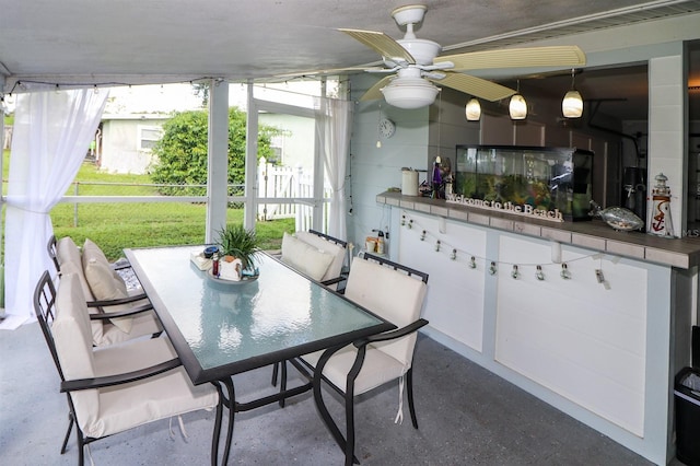 dining area featuring ceiling fan