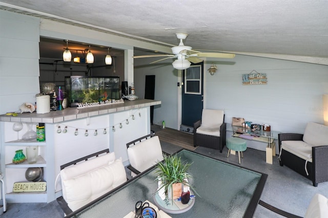 22119 Laramore Ave, Port Charlotte, FL 33952 - living area with a textured ceiling and a ceiling fan