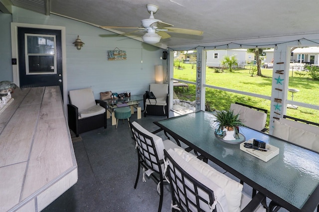 22119 Laramore Ave, Port Charlotte, FL 33952 - sunroom with outdoor dining area and a ceiling fan