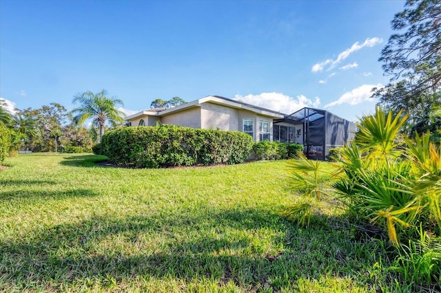 5092 Mahogany Run Ave, Sarasota, FL 34241 - view of green lawn featuring a lanai