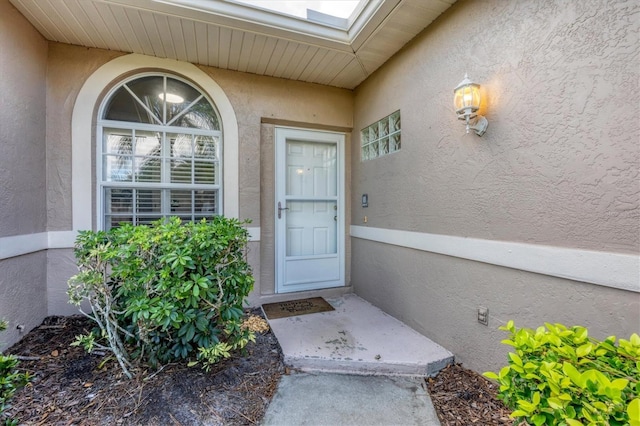 5092 Mahogany Run Ave, Sarasota, FL 34241 - property entrance featuring stucco siding