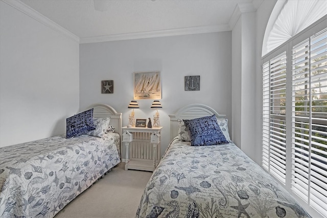 bedroom featuring light colored carpet, ceiling fan, and crown molding