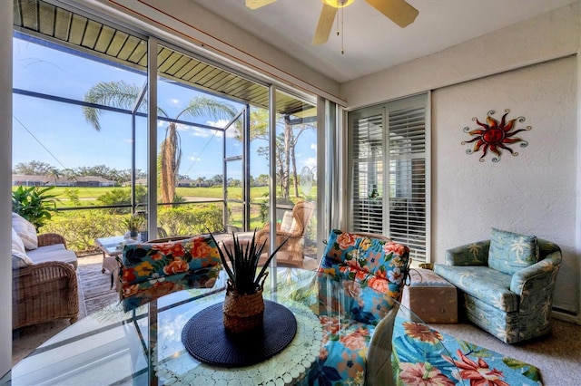 sunroom / solarium with ceiling fan