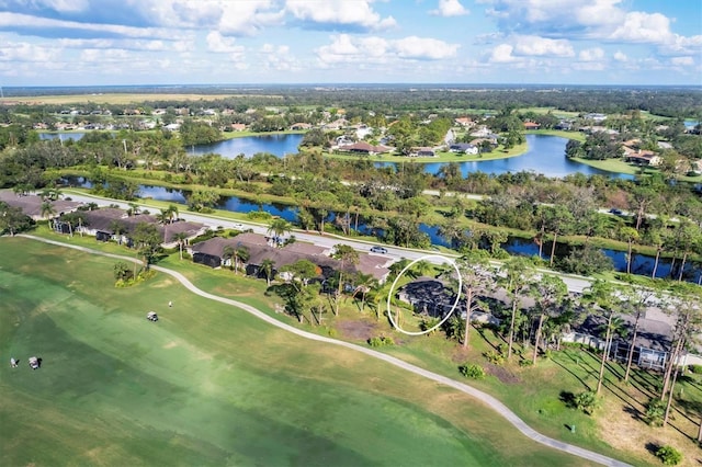 5092 Mahogany Run Ave, Sarasota, FL 34241 - aerial perspective of suburban area with a golf course, a tree filled landscape, and a nearby body of water