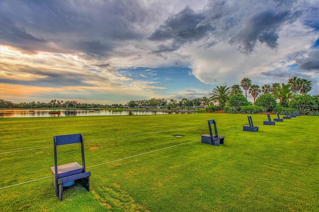 5092 Mahogany Run Ave, Sarasota, FL 34241 - view of community featuring a water view and a yard