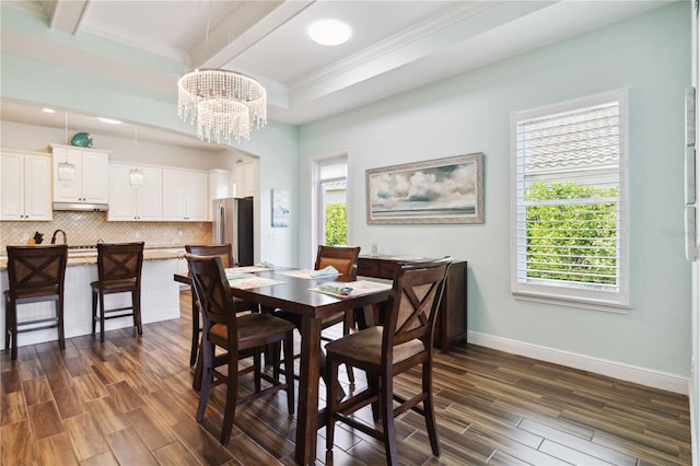 dining space featuring ornamental molding, beamed ceiling, dark hardwood / wood-style flooring, and a healthy amount of sunlight