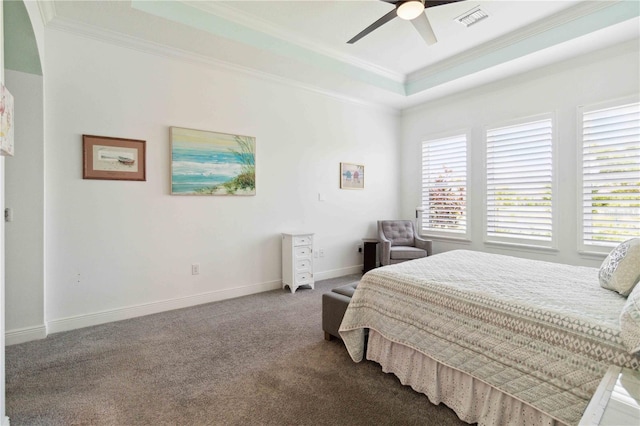 carpeted bedroom featuring crown molding and ceiling fan