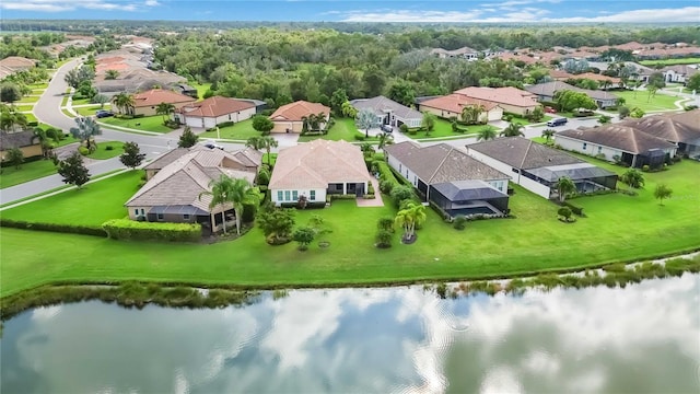 drone / aerial view with a water view