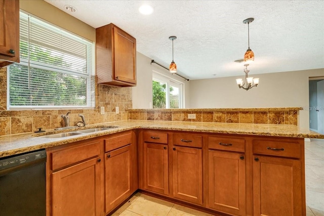 kitchen with light tile patterned floors, tasteful backsplash, a textured ceiling, decorative light fixtures, and dishwasher