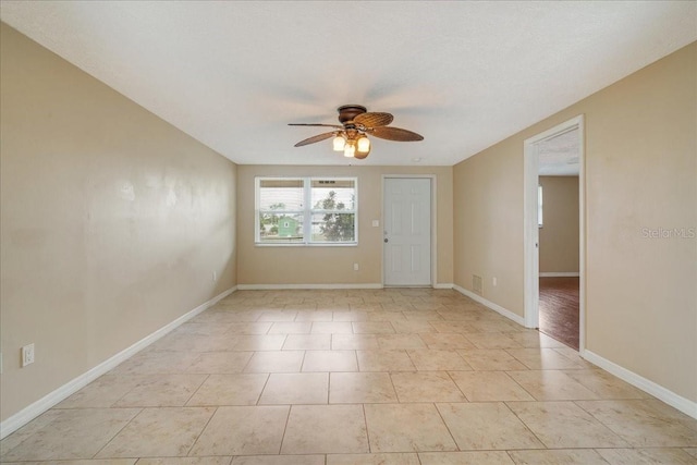 spare room featuring ceiling fan