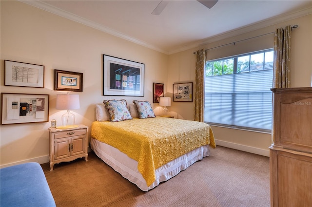 carpeted bedroom with crown molding and ceiling fan