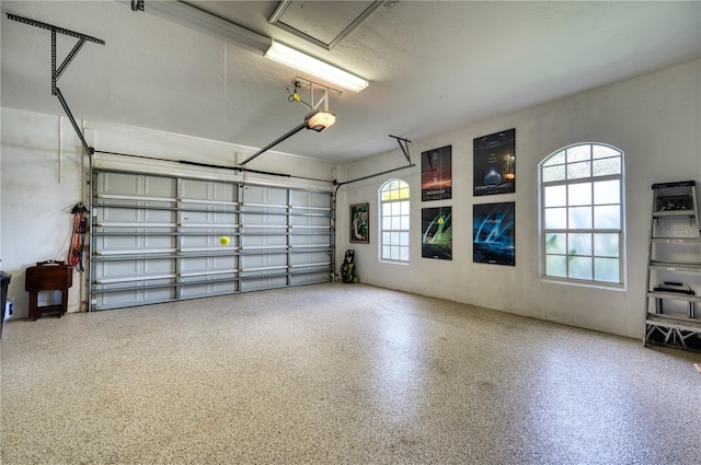 garage featuring a garage door opener