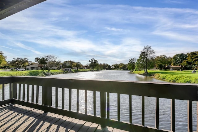 wooden terrace with a water view