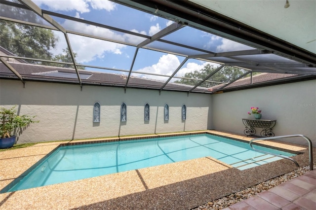 pool featuring glass enclosure