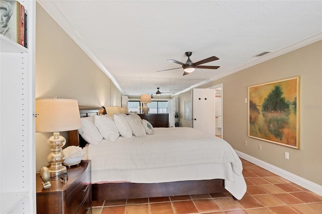 bedroom with tile patterned flooring, a ceiling fan, baseboards, visible vents, and crown molding