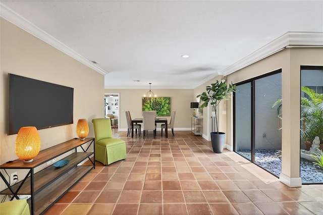 sitting room with a chandelier, crown molding, baseboards, and tile patterned floors