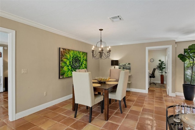 tiled dining area featuring baseboards, ornamental molding, visible vents, and an inviting chandelier