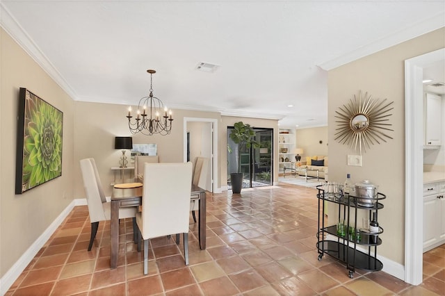 dining space with baseboards, visible vents, and ornamental molding