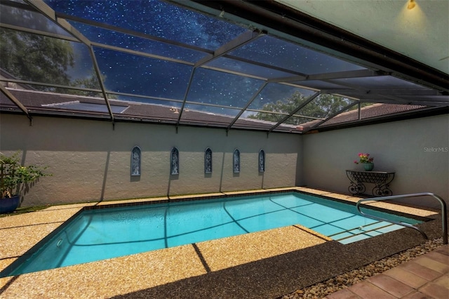 pool featuring glass enclosure