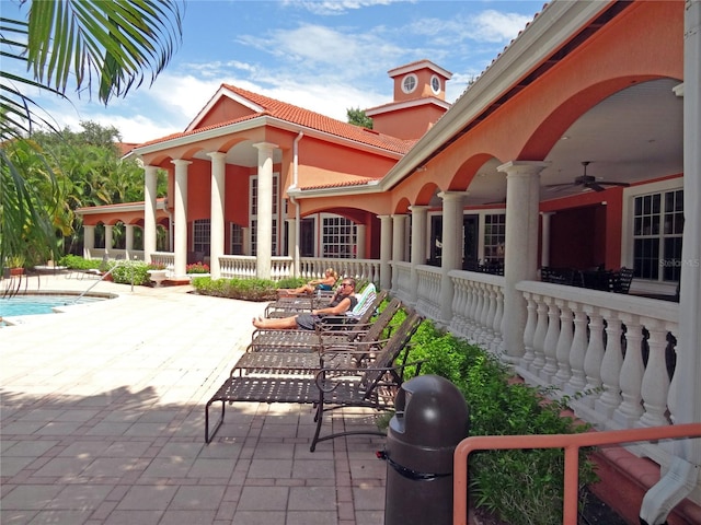 view of patio / terrace featuring ceiling fan