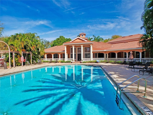 view of pool featuring a patio area