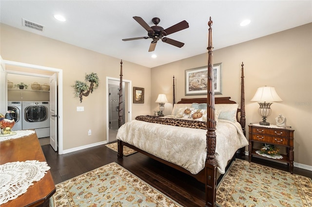 bedroom with washer and dryer, ceiling fan, and dark wood-type flooring