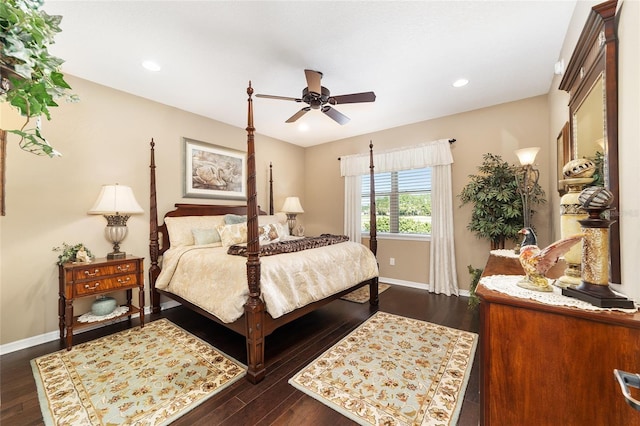 bedroom featuring ceiling fan and dark hardwood / wood-style flooring