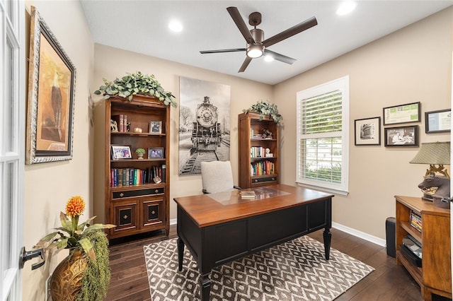 office space featuring ceiling fan and dark wood-type flooring