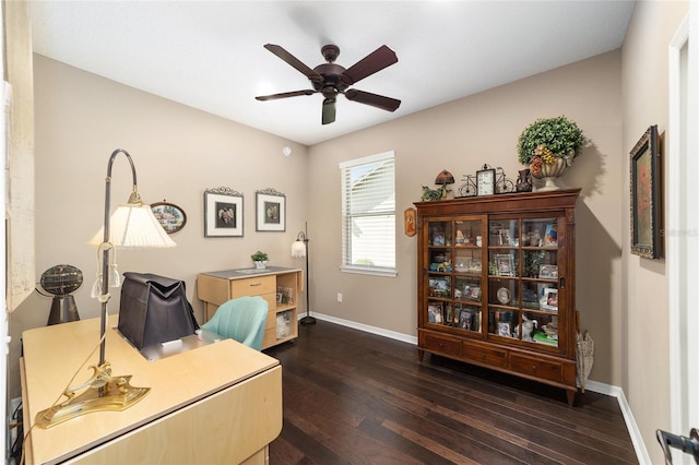 office with ceiling fan and dark wood-type flooring