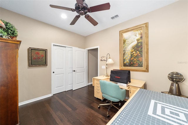 office area featuring ceiling fan and dark wood-type flooring