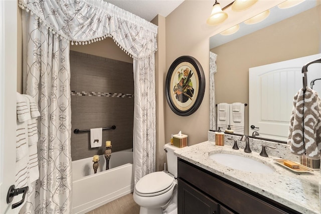 full bathroom with shower / tub combo, vanity, and toilet