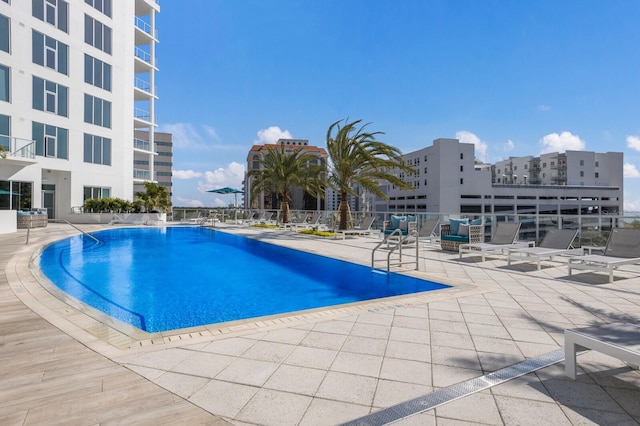 view of swimming pool featuring a patio