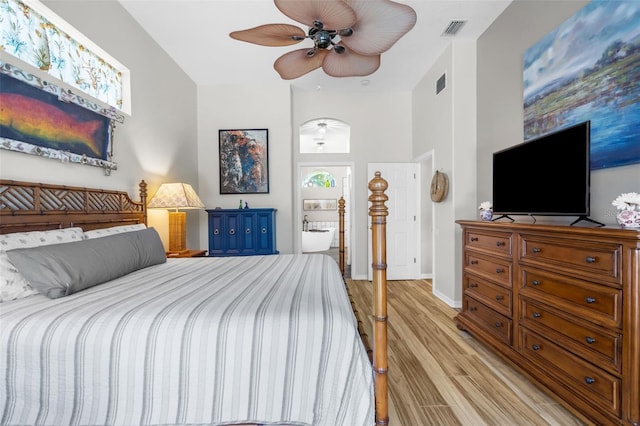 bedroom with ceiling fan and light wood-type flooring